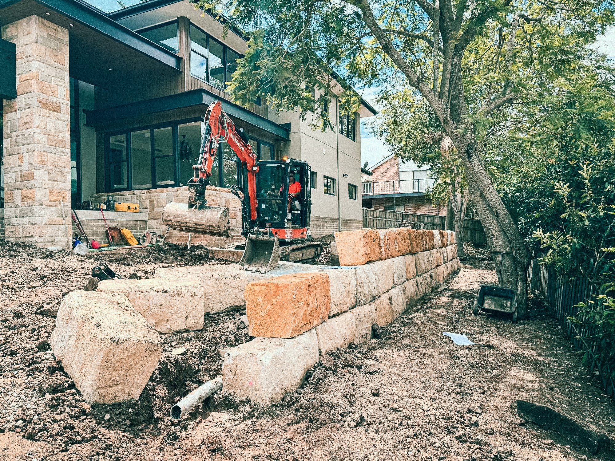Sandstone block installation and landscaping